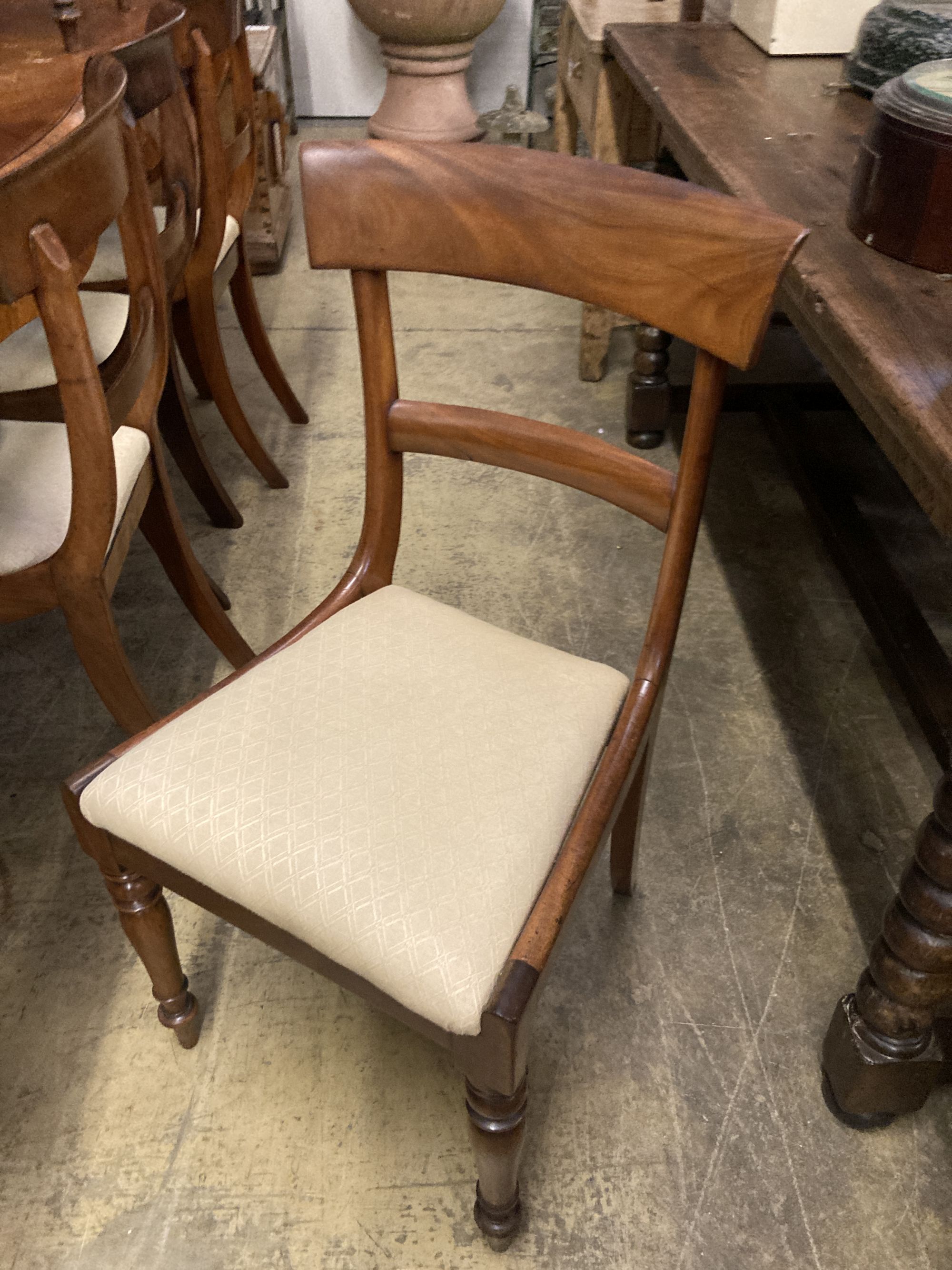 A harlequin set of eight early Victorian mahogany dining chairs